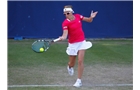 BIRMINGHAM, ENGLAND - JUNE 12:  Kirsten Flipkens of Belgium hits a return during Day Four of the Aegon Classic at Edgbaston Priory Club on June 12, 2014 in Birmingham, England.  (Photo by Paul Thomas/Getty Images)